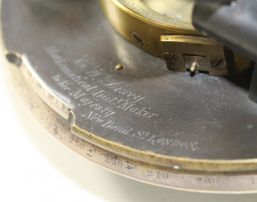 A VICTORIAN BRASS AND LACQUERED THEODOLITE by C.W. Dixey Image