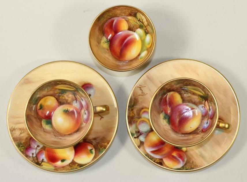 A PAIR OF ROYAL WORCESTER CHINA MINIATURE TEACUPS AND SAUCERS Image