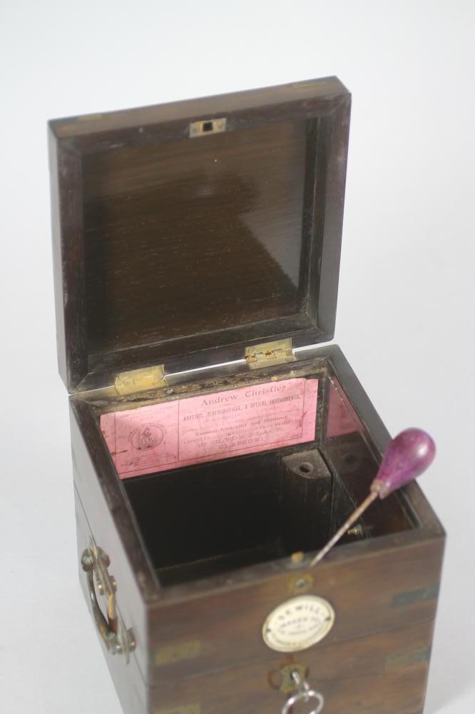 A LATE VICTORIAN BRASS BOUND MAHOGANY SHIP'S COMPASS CASE of typical cube form Image
