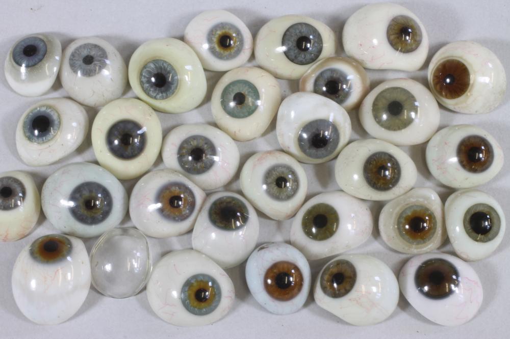A COLLECTION OF OPTOMOTRIST'S GLASS EYES Image
