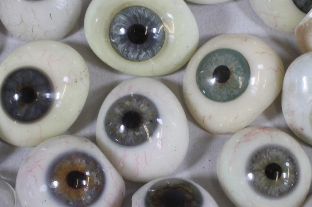 A COLLECTION OF OPTOMOTRIST'S GLASS EYES Image