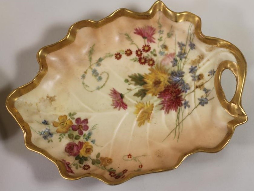 A COLLECTION OF LATE VICTORIAN ROYAL WORCESTER BLUSH IVORY PORCELAIN comprising a pair of leaf Image