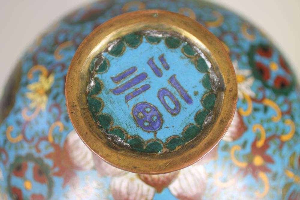 A CHINESE CLOISONNE ENAMEL VASE of squat globular form on a swept foot Image