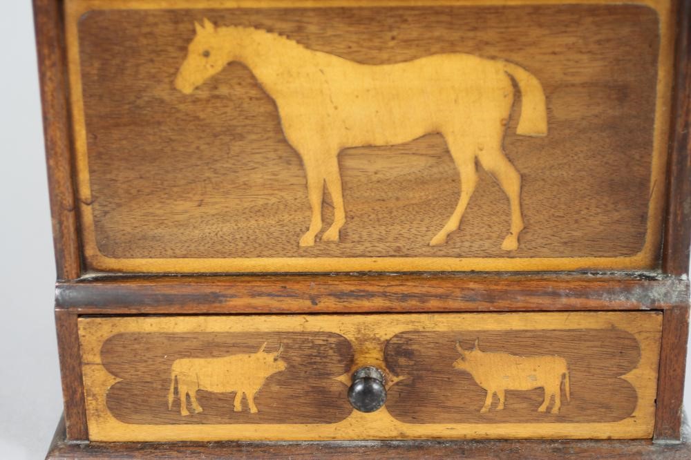 A VICTORIAN OAK CANDLE BOX of oblong form inlaid in fruitwood with birds and animals Image
