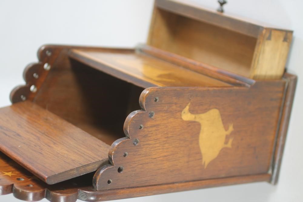 A VICTORIAN OAK CANDLE BOX of oblong form inlaid in fruitwood with birds and animals Image