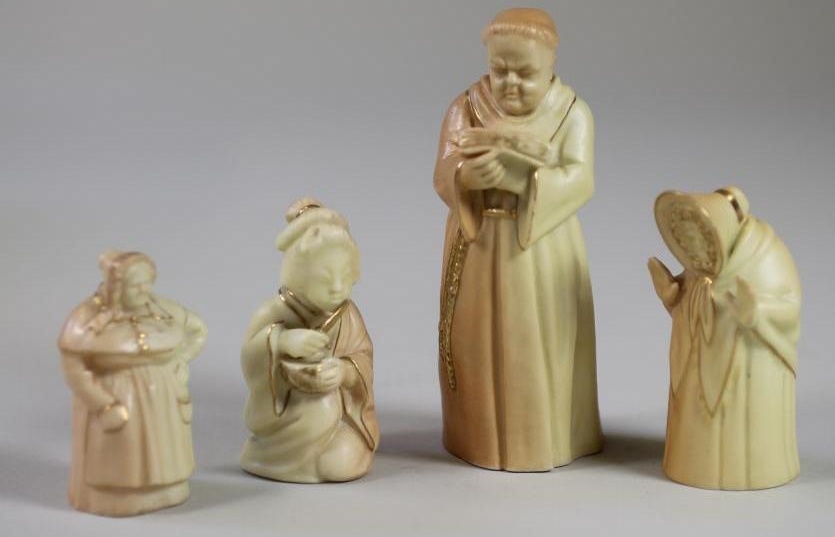 A COLLECTION OF FOUR ROYAL WORCESTER CHINA BLUSH IVORY CANDLE SNUFFERS Image