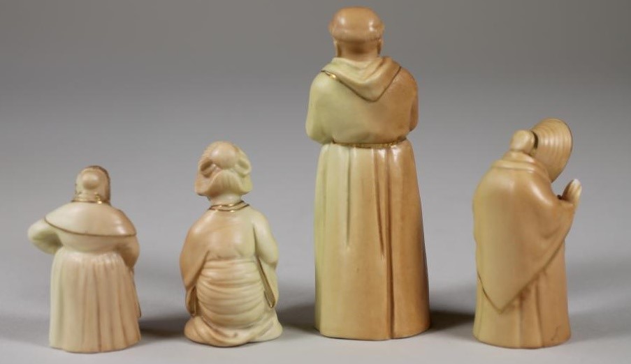 A COLLECTION OF FOUR ROYAL WORCESTER CHINA BLUSH IVORY CANDLE SNUFFERS Image