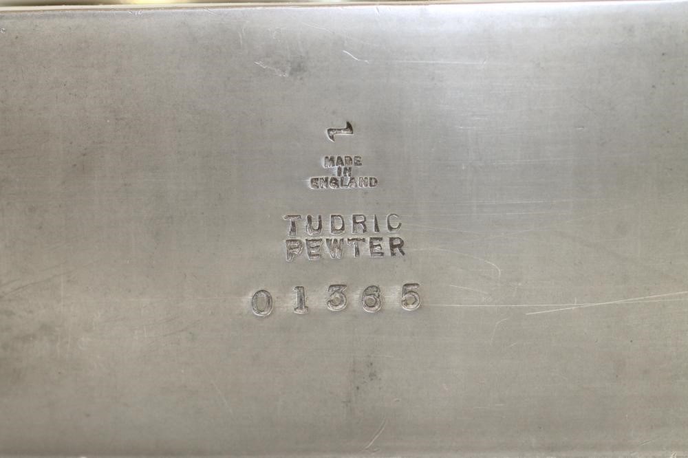 A TUDRIC PEWTER THREE PIECE MANTEL GARNITURE Image