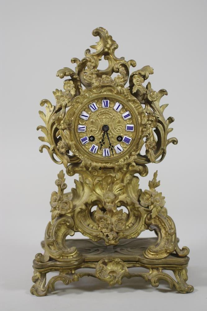 A FRENCH GILT METAL MANTEL CLOCK Image