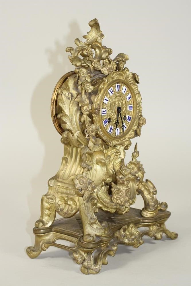A FRENCH GILT METAL MANTEL CLOCK Image