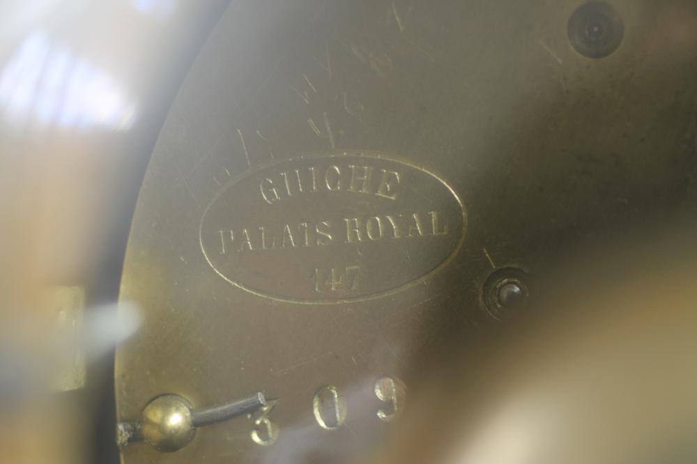 A FRENCH GILT METAL MANTEL CLOCK Image