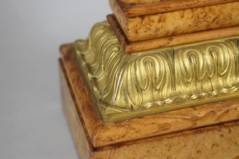 A FRENCH BURR MAPLE AND ORMOLU MANTEL CLOCK Image