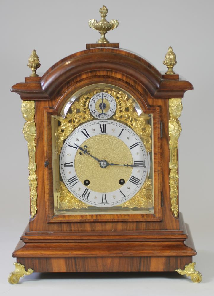 A MAHOGANY AND ORMOLU CASED MANTEL CLOCK Image