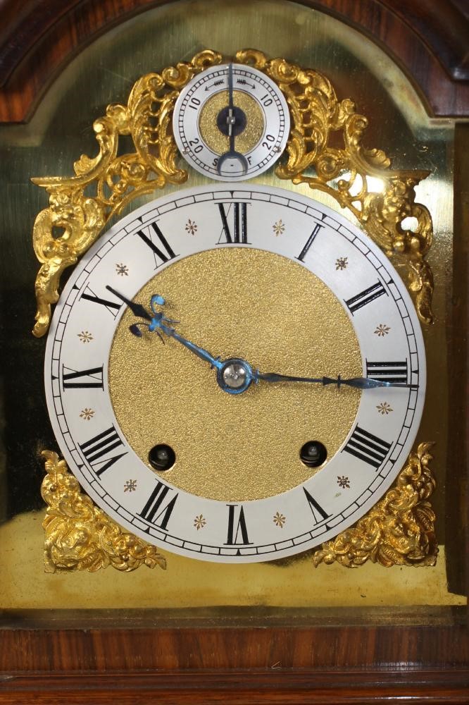 A MAHOGANY AND ORMOLU CASED MANTEL CLOCK Image