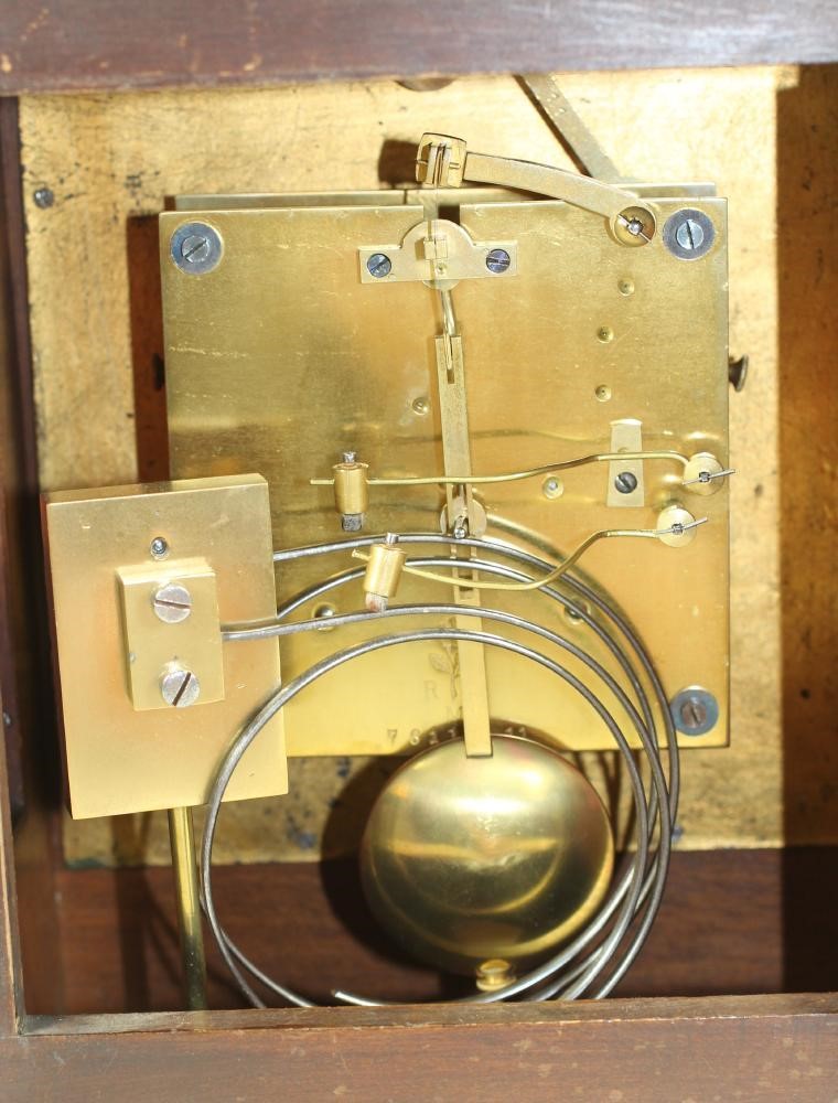 A MAHOGANY AND ORMOLU CASED MANTEL CLOCK Image