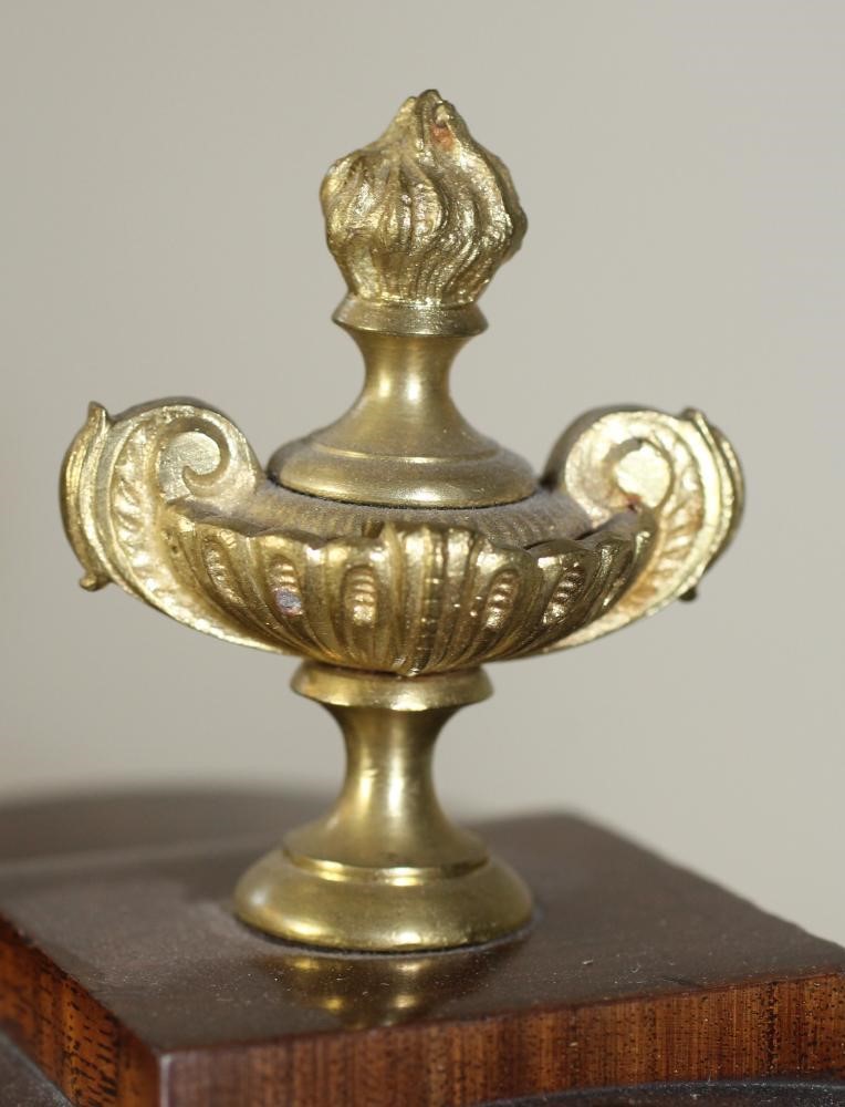 A MAHOGANY AND ORMOLU CASED MANTEL CLOCK Image