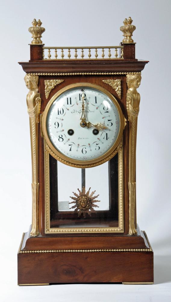 A FRENCH MAHOGANY AND ORMOLU FOUR GLASS MANTEL CLOCK Image