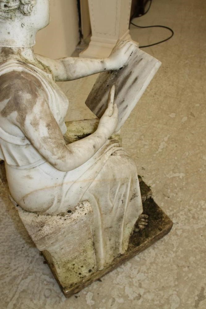 A WHITE MARBLE FIGURE OF A SEATED CLASSICAL MAIDEN DRAWING Image