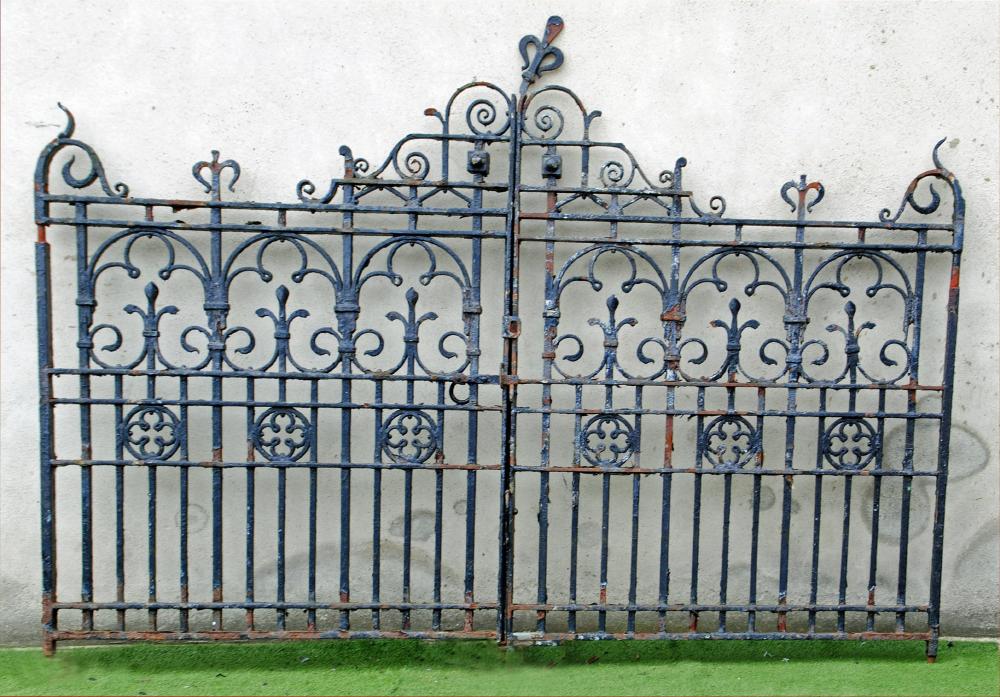 A PAIR OF WROUGHT AND CAST IRON ENTRANCE GATES Image