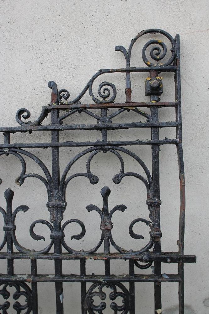 A PAIR OF WROUGHT AND CAST IRON ENTRANCE GATES Image