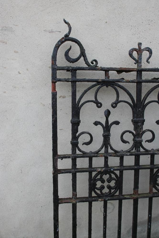 A PAIR OF WROUGHT AND CAST IRON ENTRANCE GATES Image