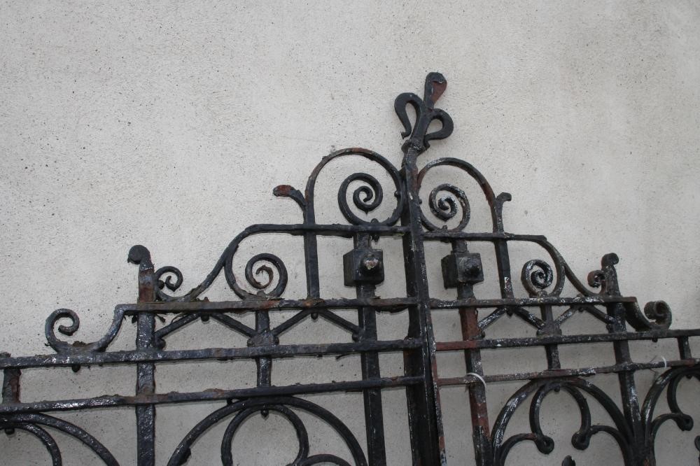 A PAIR OF WROUGHT AND CAST IRON ENTRANCE GATES Image