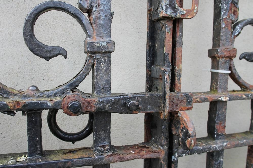 A PAIR OF WROUGHT AND CAST IRON ENTRANCE GATES Image