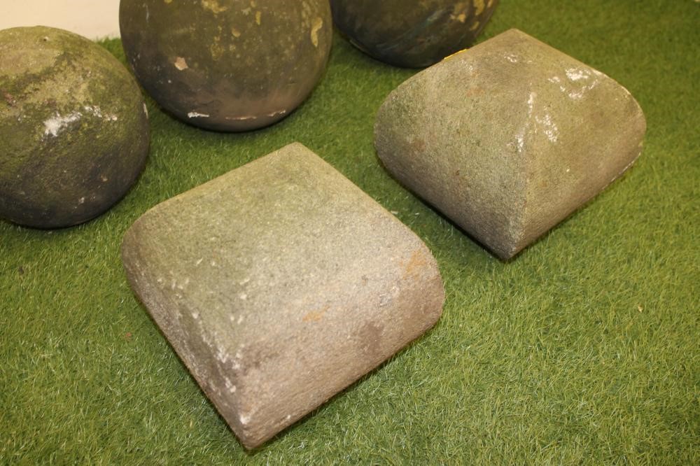 A PAIR OF STONE SPHERES Image