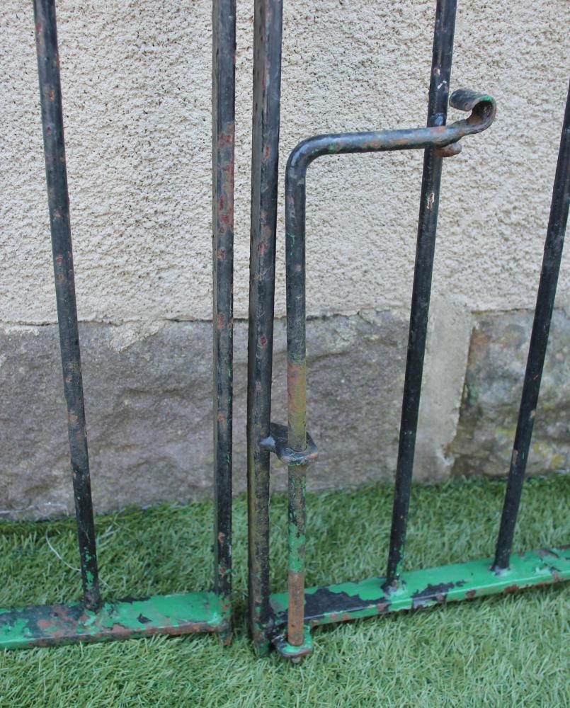 A PAIR OF WROUGHT IRON PEDESTRIAN GATES Image