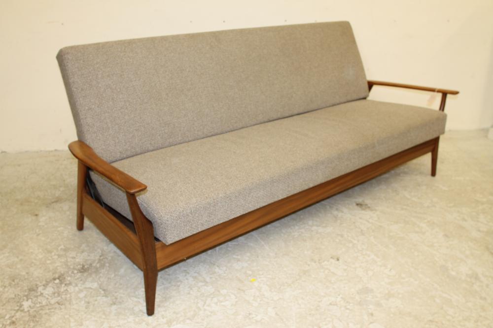 A SCANDINAVIAN DESIGN TEAK FRAMED SOFA BED Image