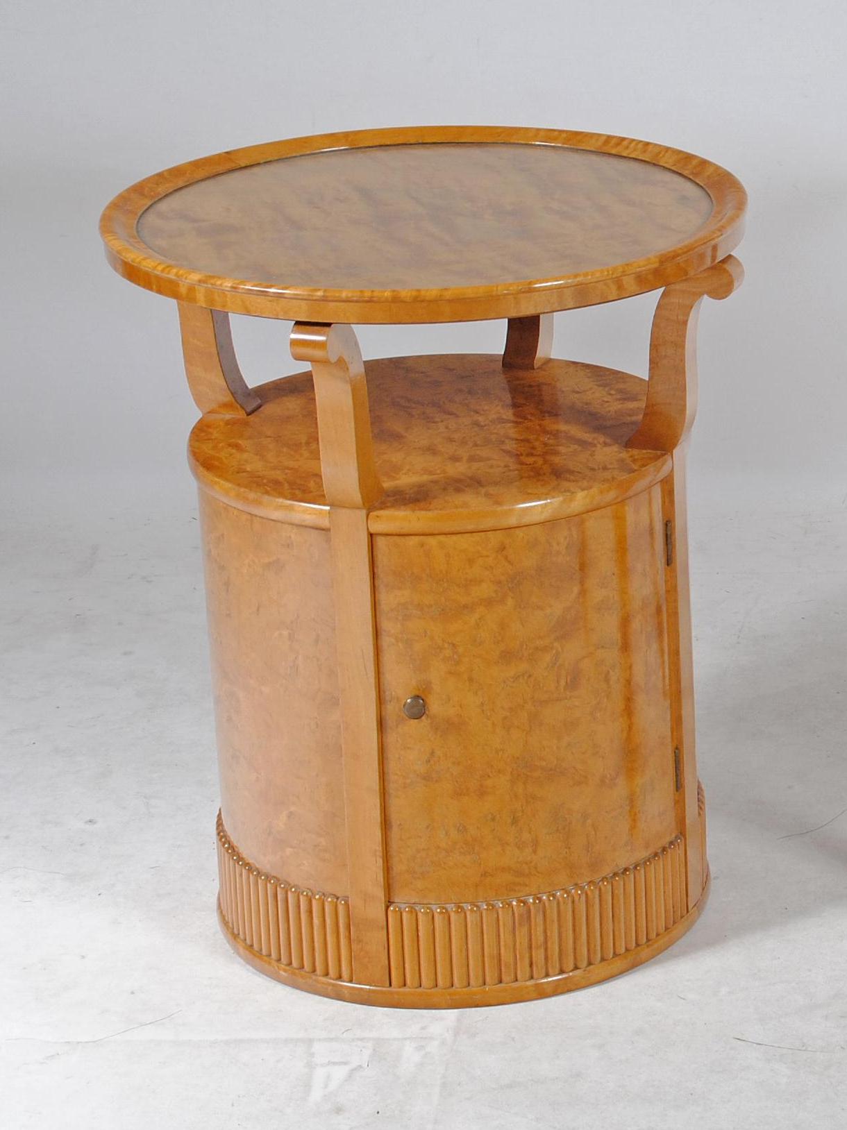 AN ART DECO MAPLE OCCASIONAL TABLE of circular form Image