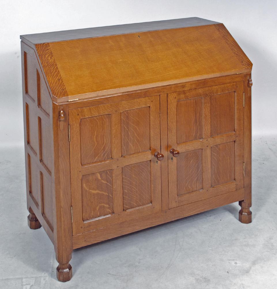 AN ADZED OAK BUREAU by Robert Thompson Image