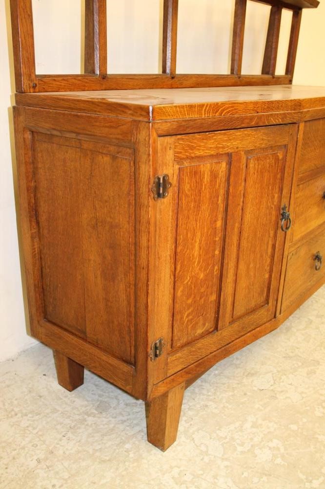 AN ARTS AND CRAFTS STYLE OAK SIDEBOARD Image
