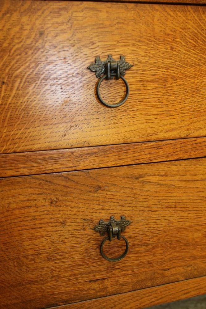 AN ARTS AND CRAFTS STYLE OAK SIDEBOARD Image