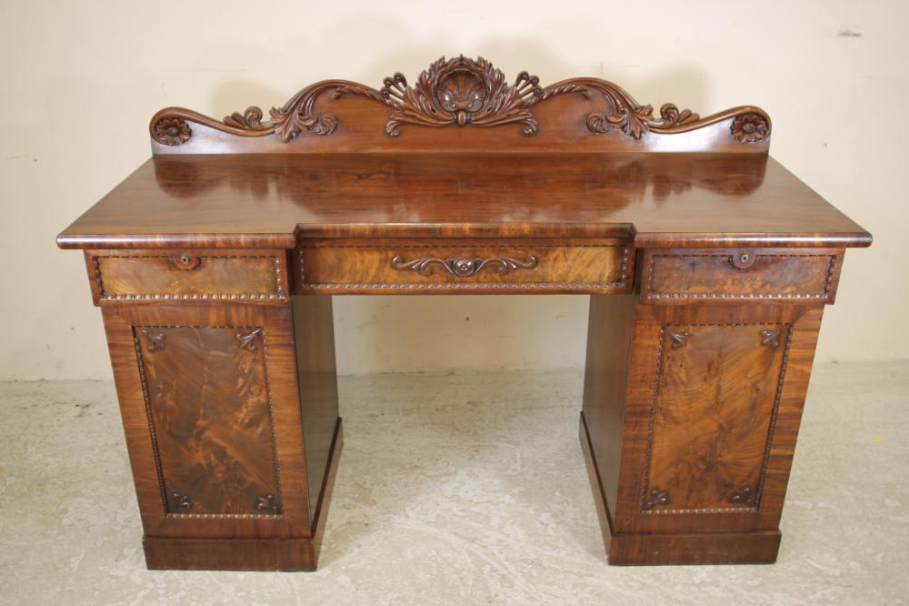 A WILLIAM IV MAHOGANY PEDESTAL SIDEBOARD Image
