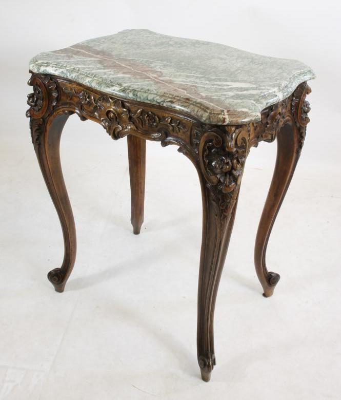 A FRENCH LOUIS XV STYLE CARVED WALNUT OCCASIONAL TABLE Image
