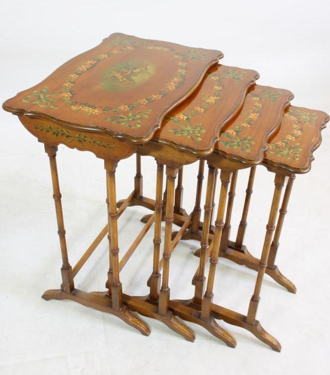 AN EDWARDIAN SATINWOOD AND POLYCHROME PAINTED QUARTETTO NEST OF TABLES of serpentine oblong form Image