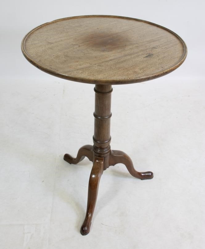 A MAHOGANY TRIPOD TABLE Image