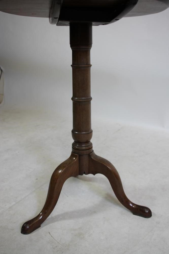 A MAHOGANY TRIPOD TABLE Image