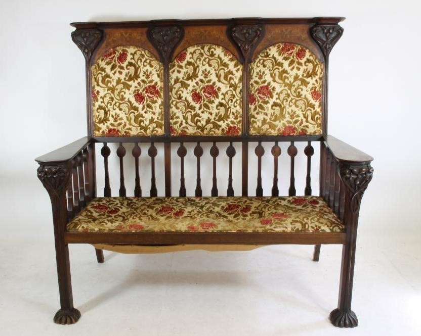 AN ART NOUVEAU MAHOGANY THREE SEATER HIGH BACK SETTLE in the manner of Shapland & Petter Image