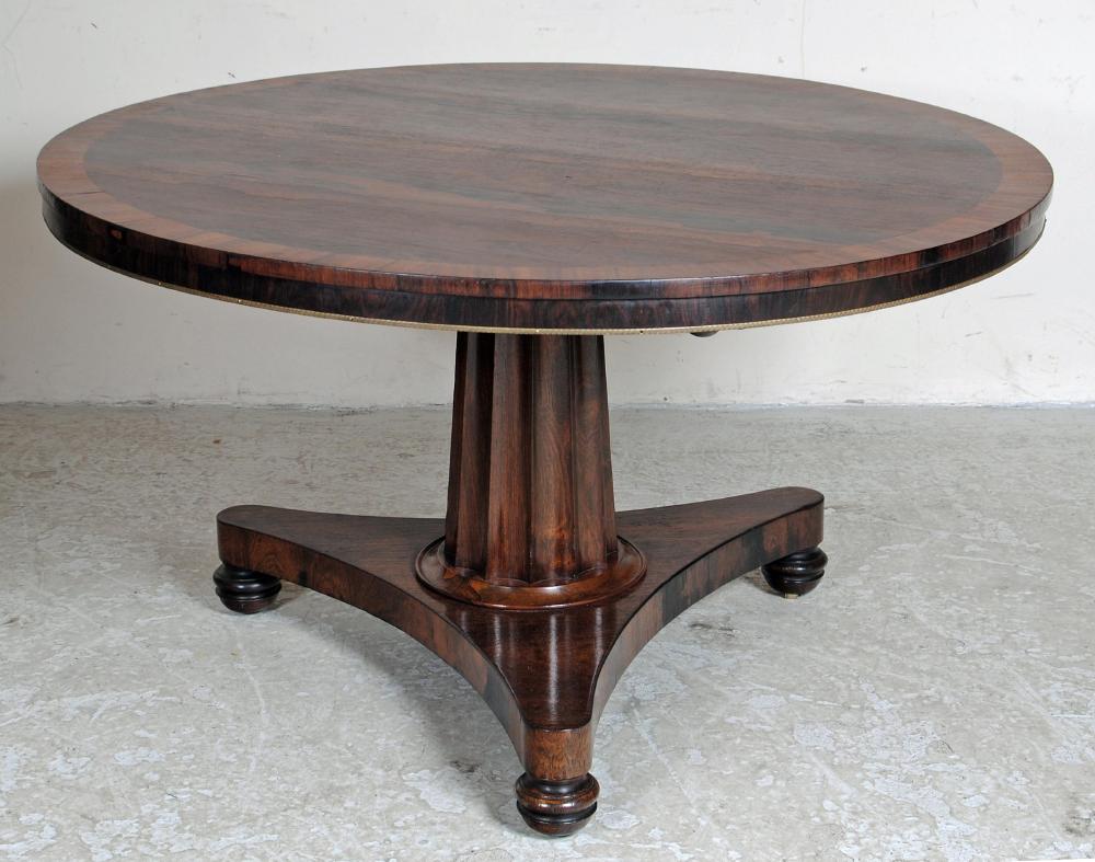 A ROSEWOOD BREAKFAST TABLE Image