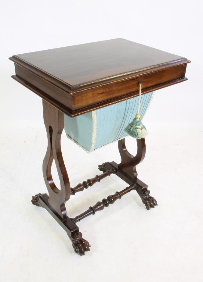 A ROSEWOOD WORKTABLE Image