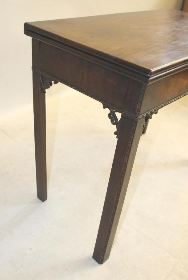 A GEORGIAN MAHOGANY FOLDING CARD TABLE Image