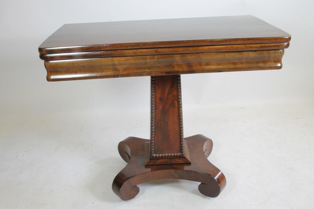 AN EARLY VICTORIAN FOLDING TEA TABLE of rounded oblong form Image
