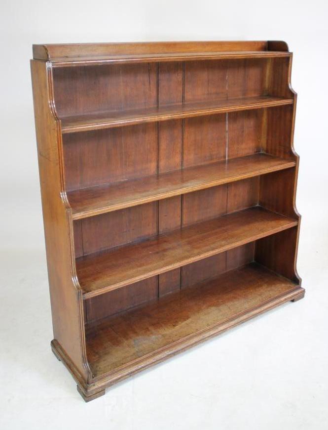 A MAHOGANY "WATERFALL" OPEN BOOKCASE Image