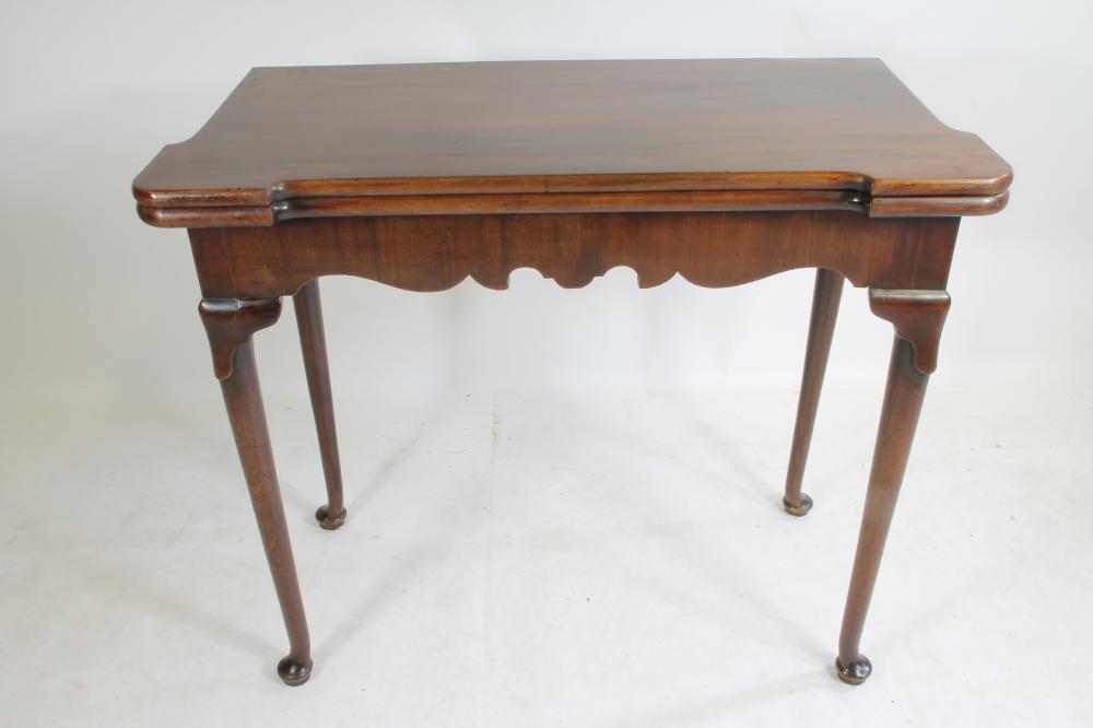 A GEORGIAN MAHOGANY FOLDING TEA TABLE Image
