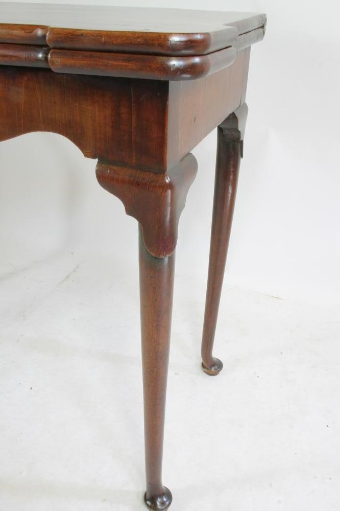 A GEORGIAN MAHOGANY FOLDING TEA TABLE Image