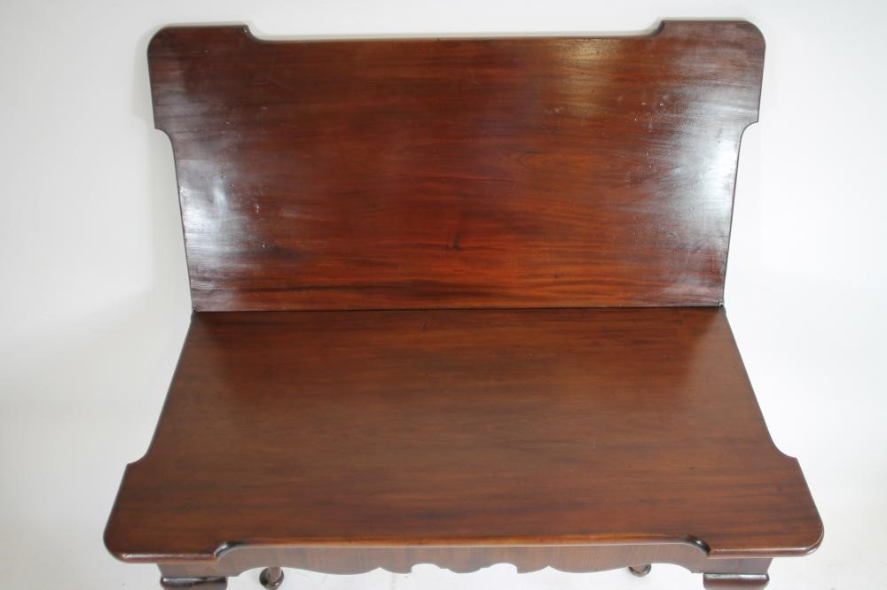A GEORGIAN MAHOGANY FOLDING TEA TABLE Image