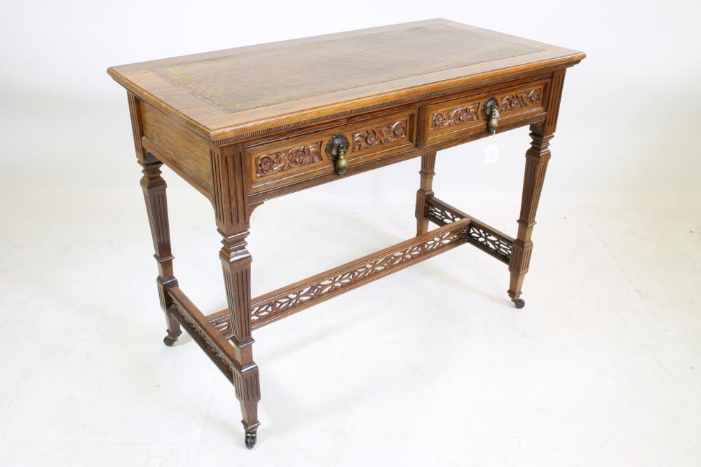 A VICTORIAN ROSEWOOD WRITING TABLE Image