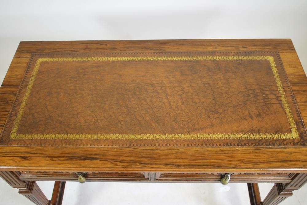 A VICTORIAN ROSEWOOD WRITING TABLE Image